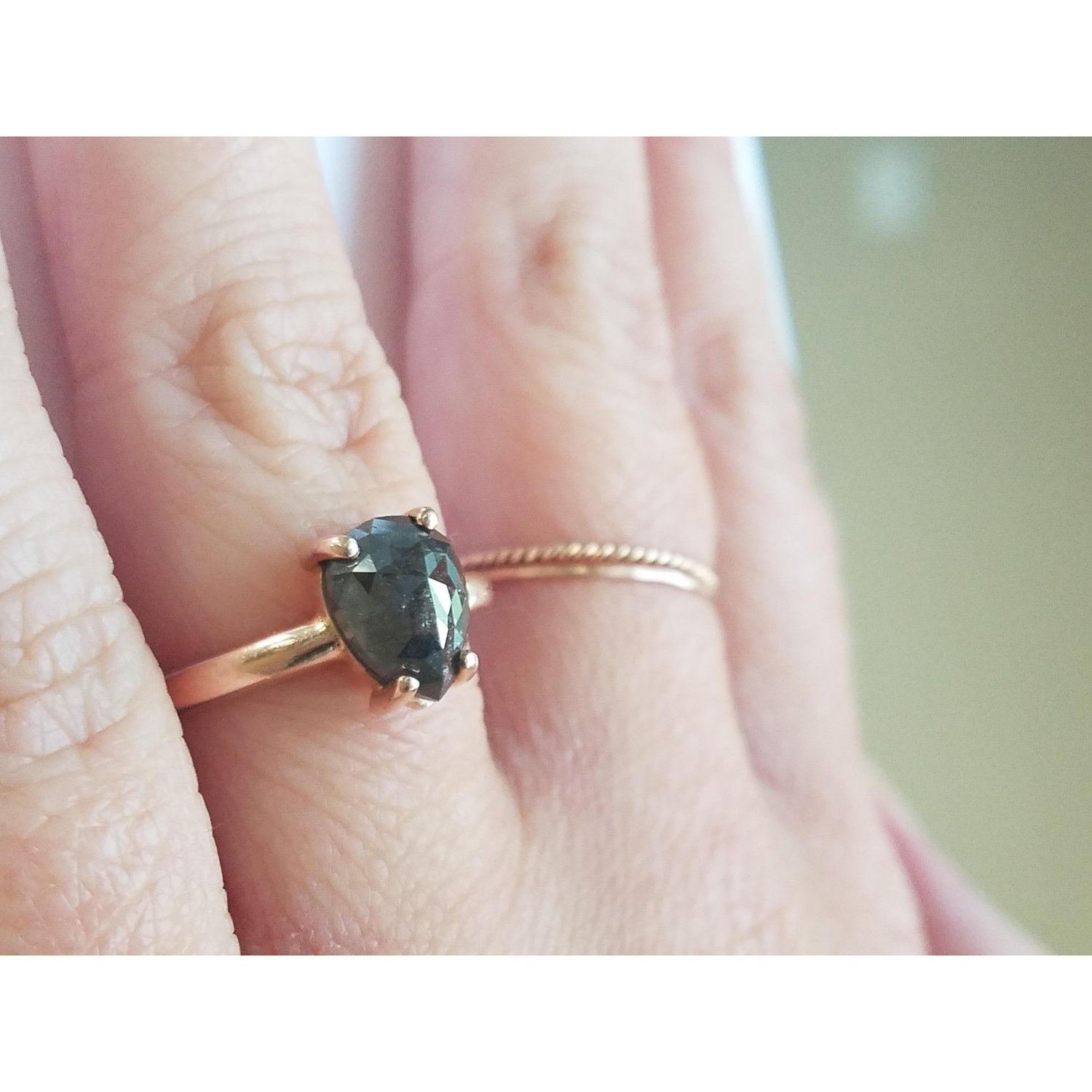 Brian’s fascination with astronomy (and Shay!) inspired him to choose a dark, Salt and Pepper Diamond ring. A pretty little galaxy on her finger.