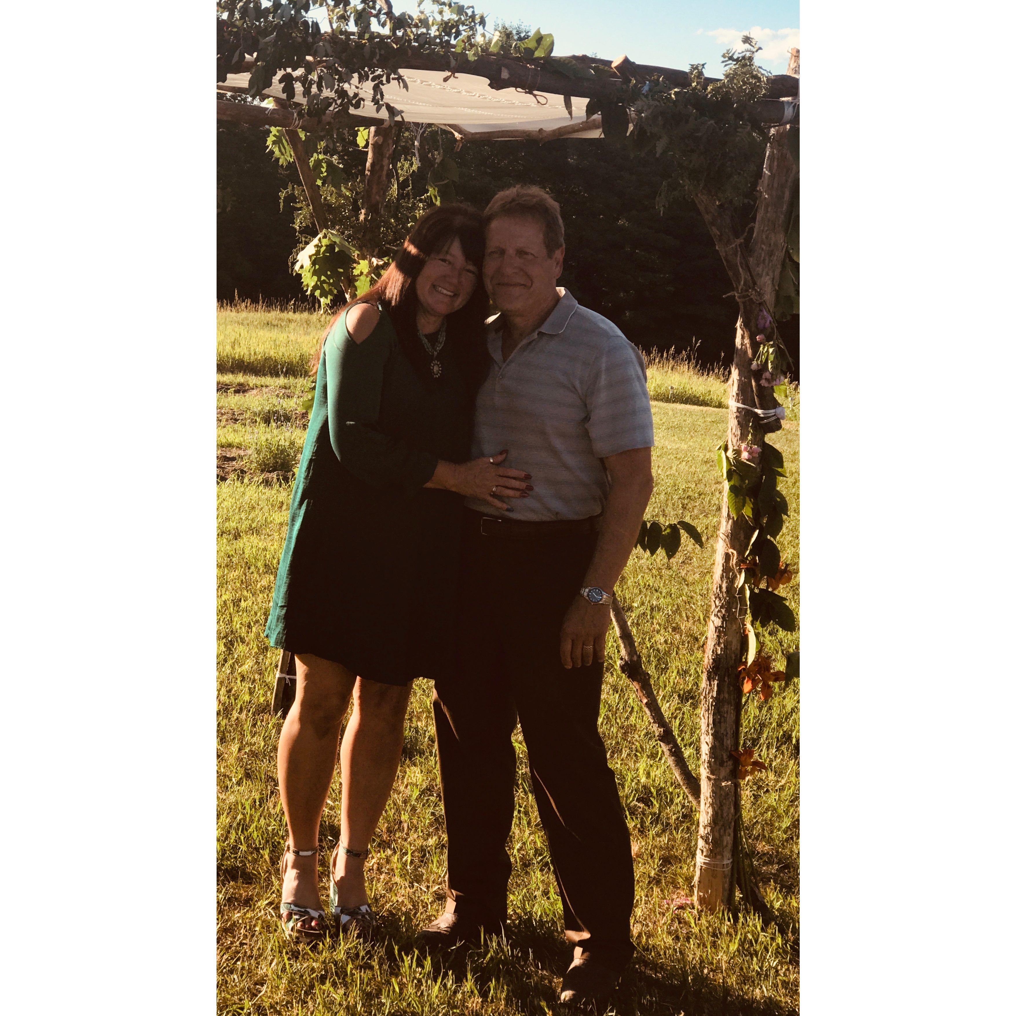Dad and Elaina, shining with love under the Chuppa we made for Gabe and Jamie's wedding