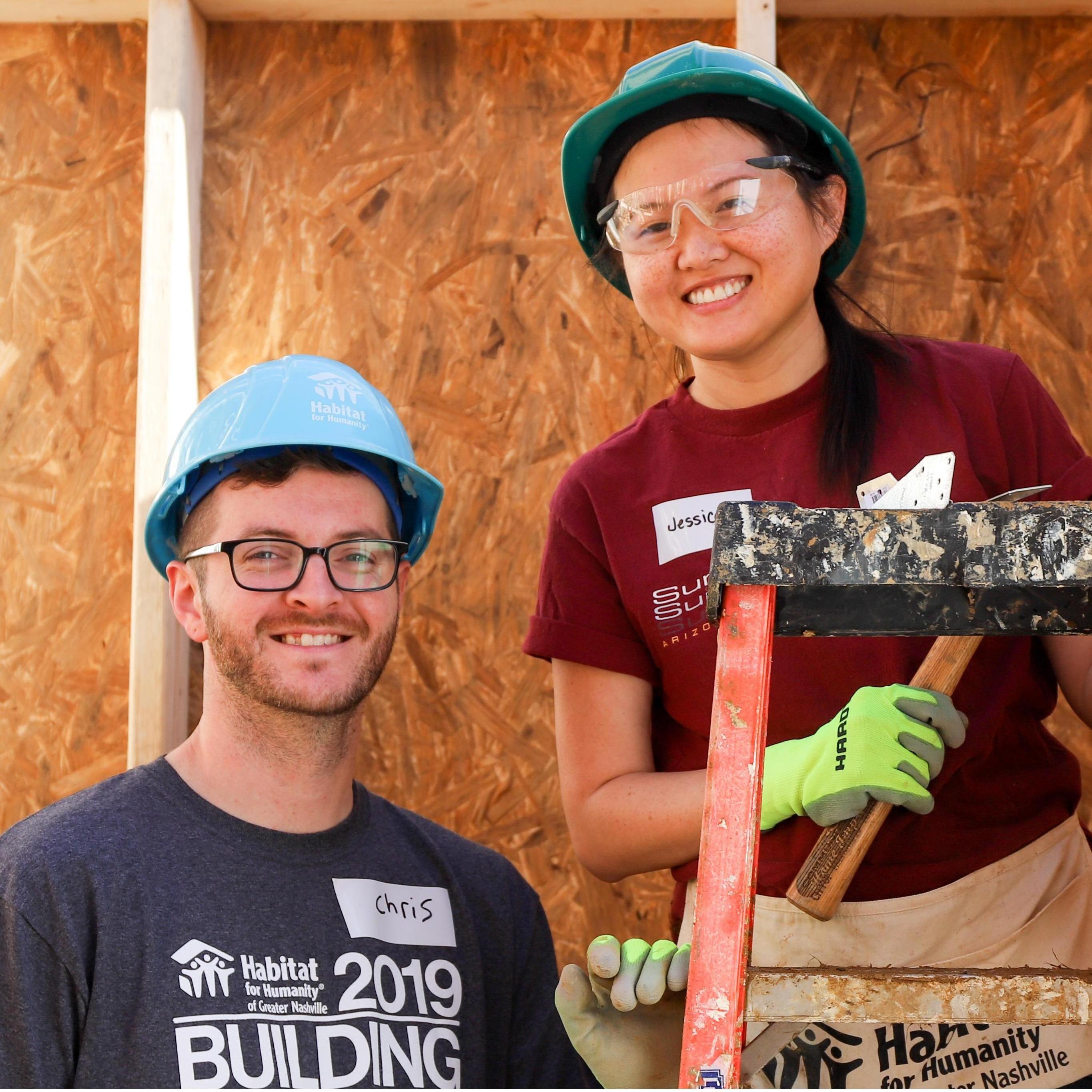 Volunteering at Habitat for Humanity together (Jessica was not nearly as good as Chris at house-building)
