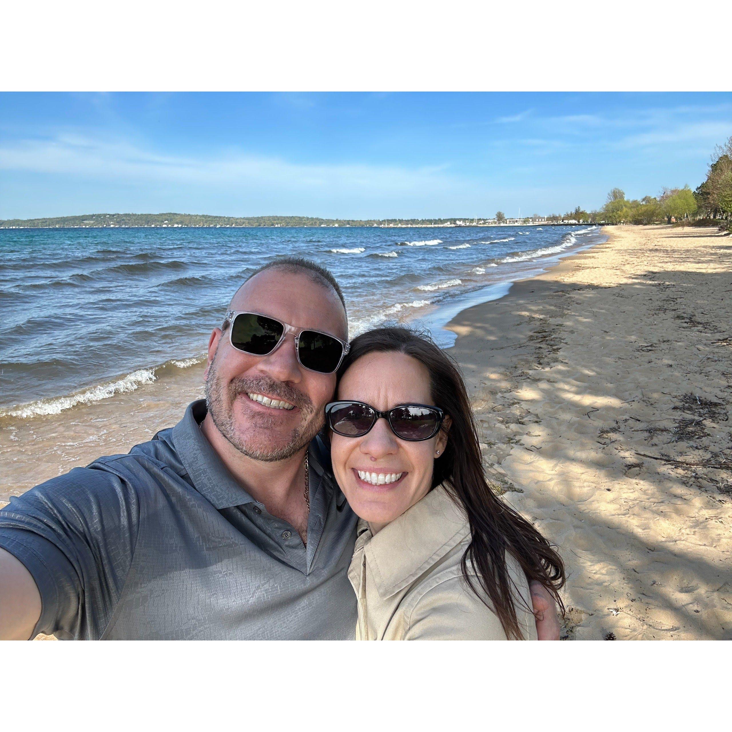 Walking along the beach in Traverse City, where we'll be getting married in May!