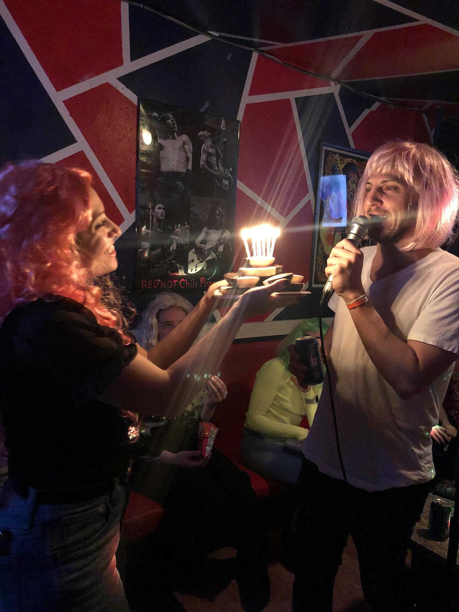 Wigs, black & white cookies, & karaoke for Alex's 30th!