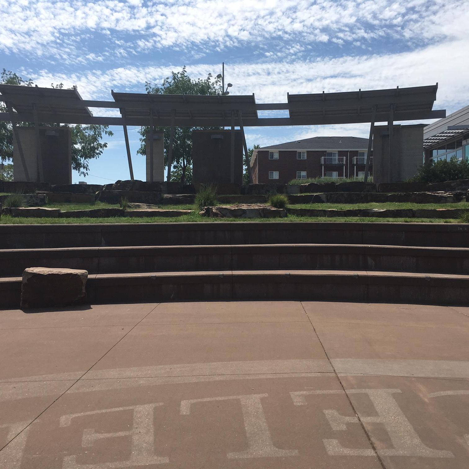 Seating at the amphitheater.  These are cement benches.  Please bring something to sit on, if desired.