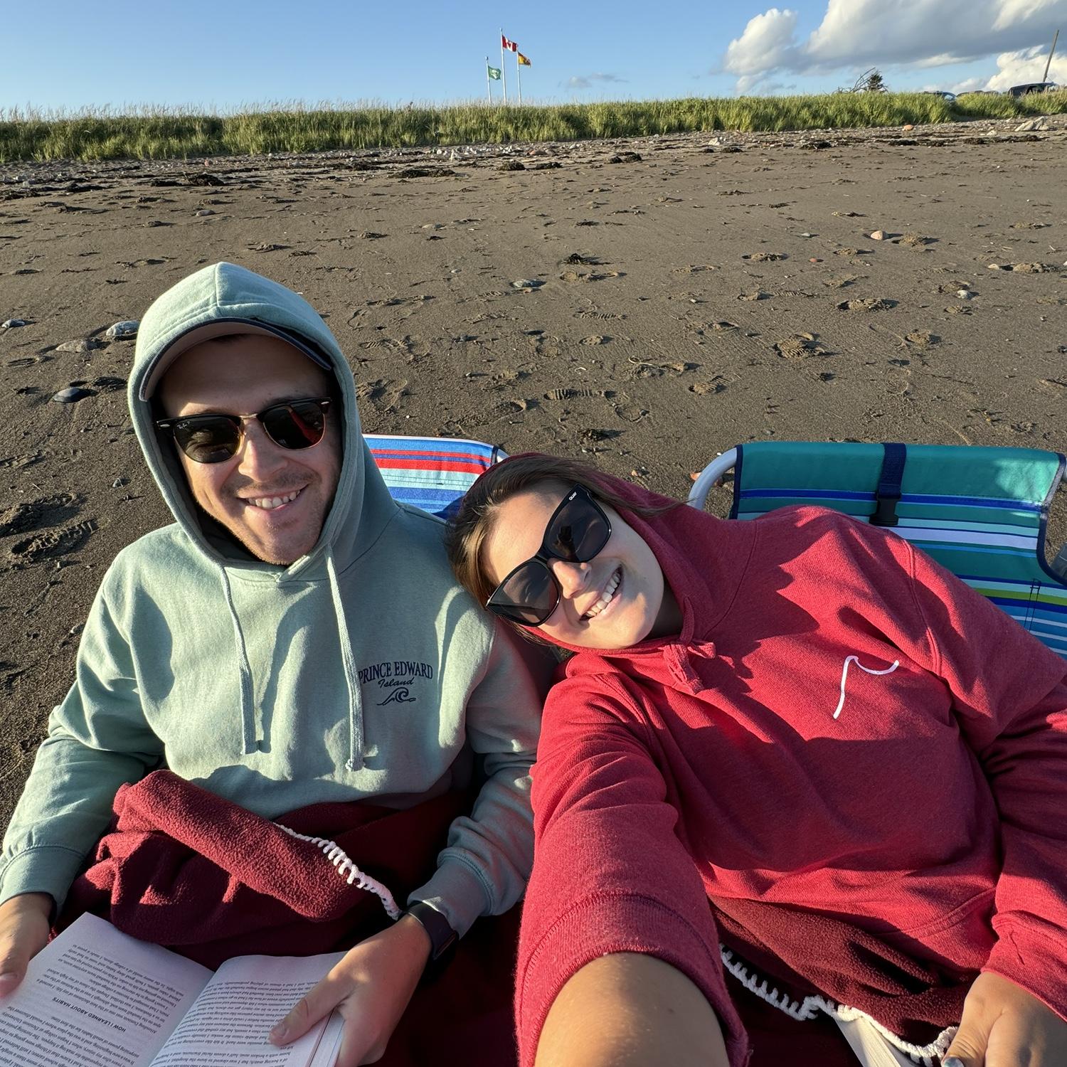 Reading at Saint's Rest Beach...almost exactly where Nick proposed three weeks later! 💍 (August 2024)