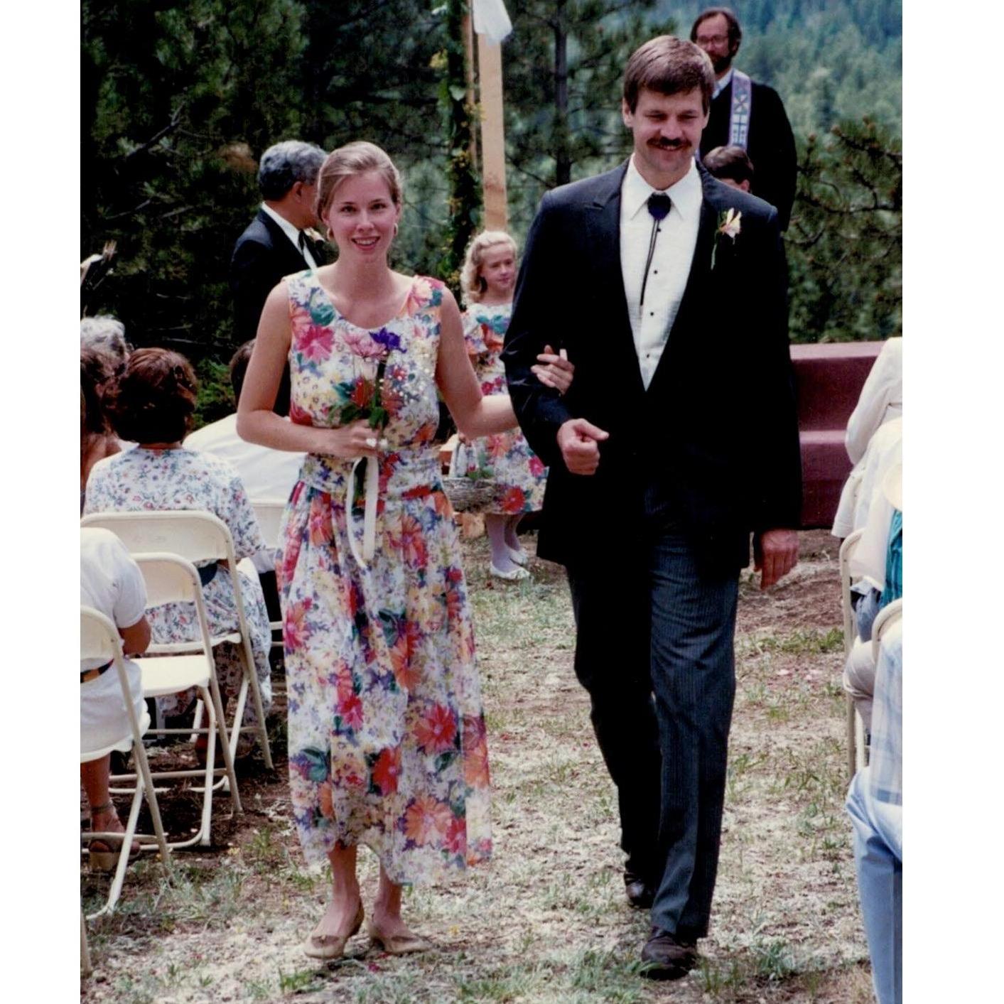 The lovely Beth Osnes & Tom Leigh (maid of honor & best man) making their way to the party