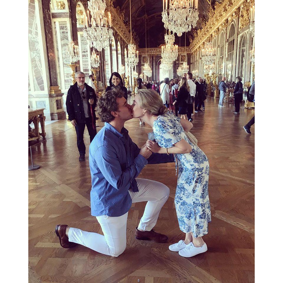 Engaged in the Hall of Mirrors at Versailles