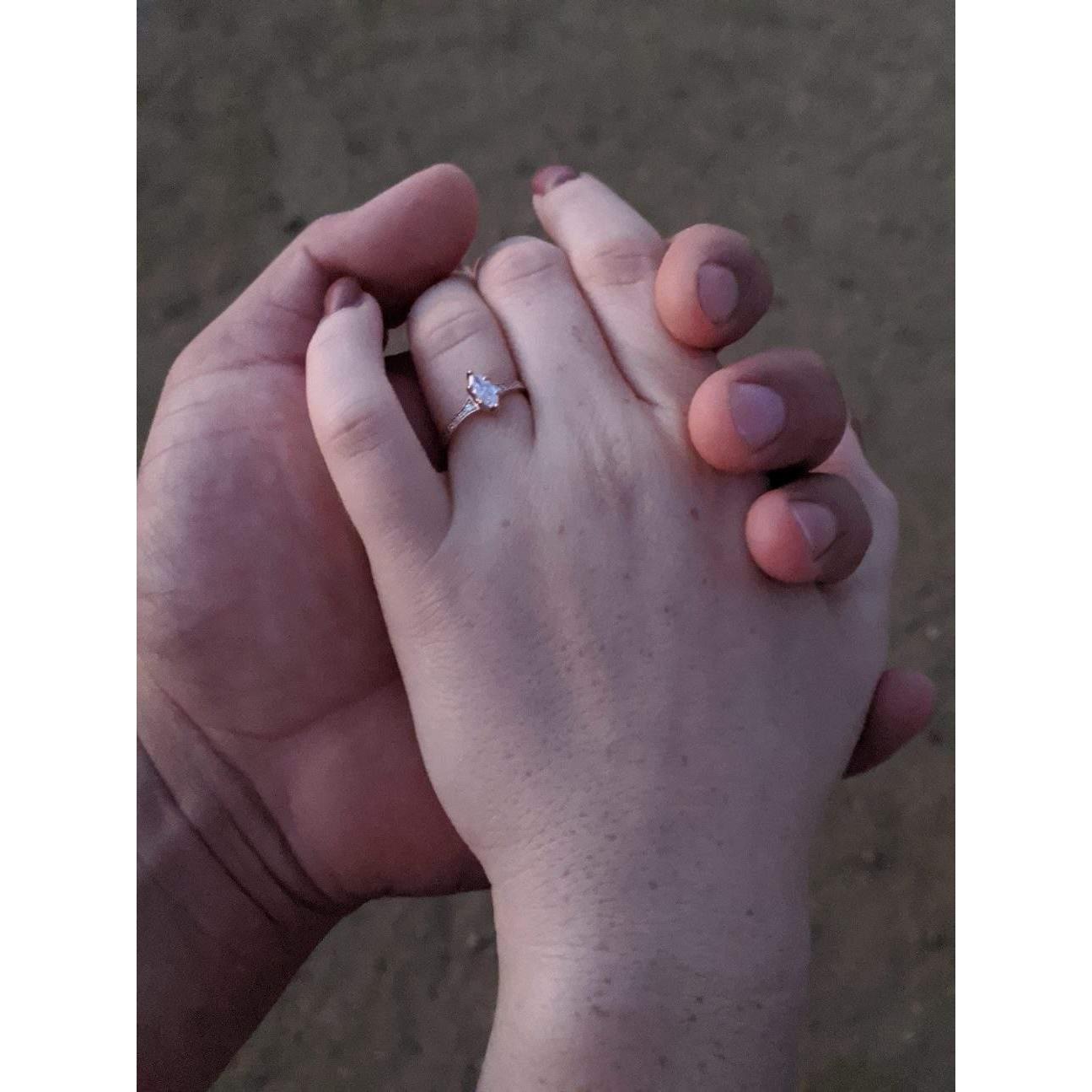The engagement ring.