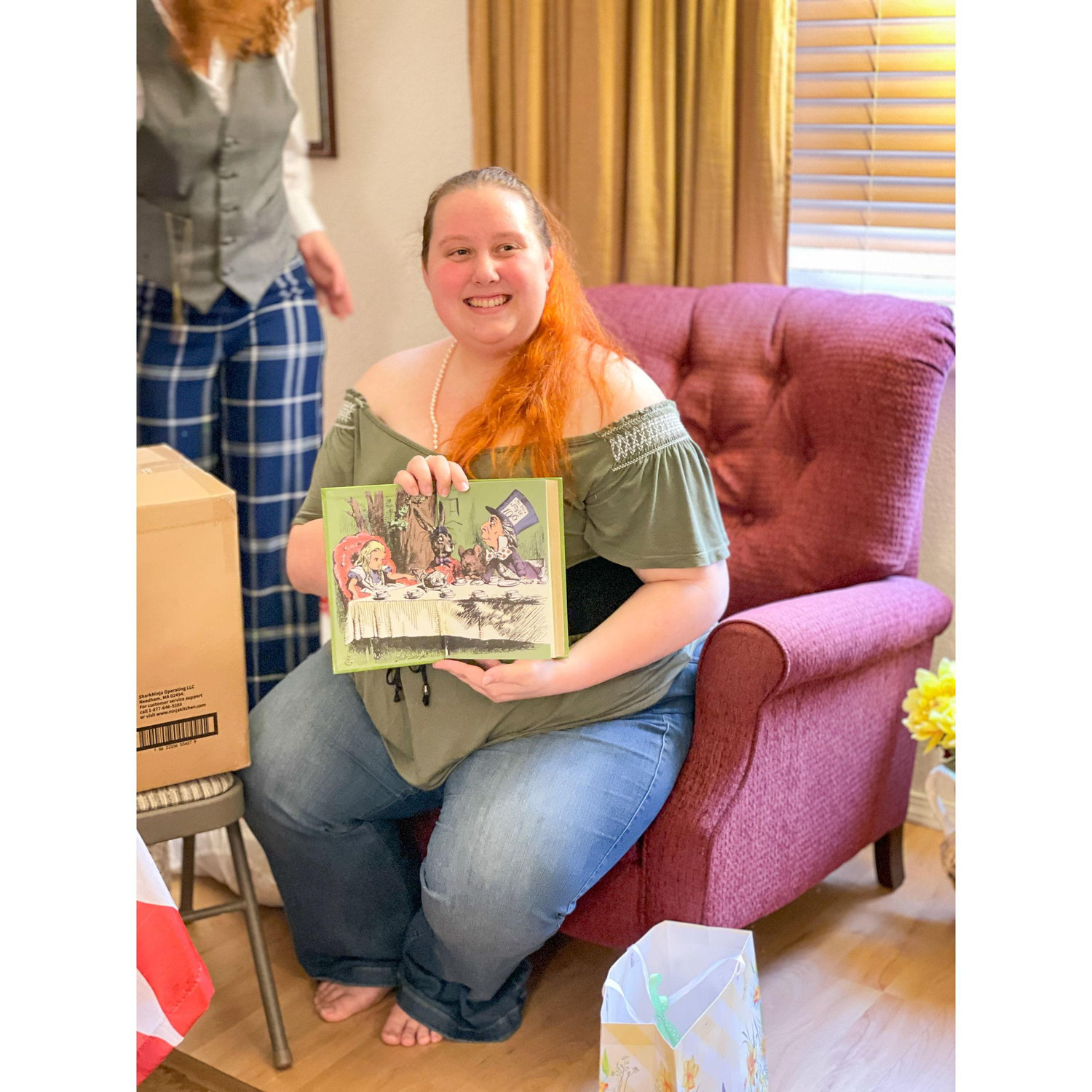 Showing off the beautiful design of the gifted Alice and Wonderland book