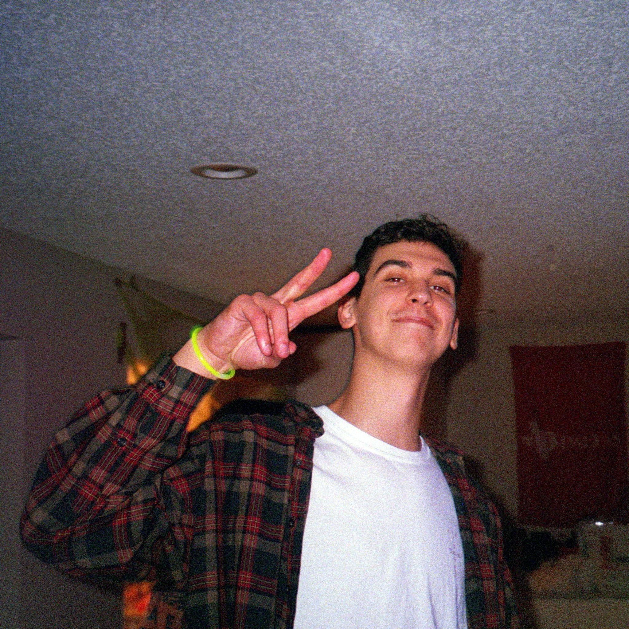 Courtney took this photo of Marcus at the Halloween party they initially met at in October of 2020. Eight months later, they found out that they both kept their glowstick bracelets from that night.