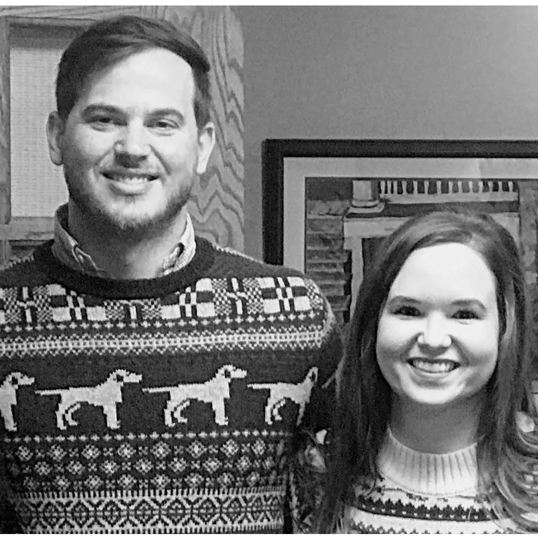 Our first Christmas together - matching, cheesy Christmas sweaters and all!