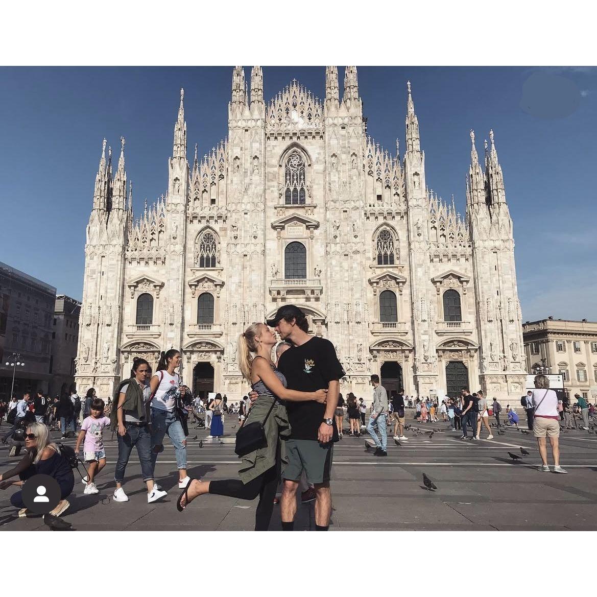 A picture from our Europe adventure in 2019 -  Smooches in front of Duomo di Milano