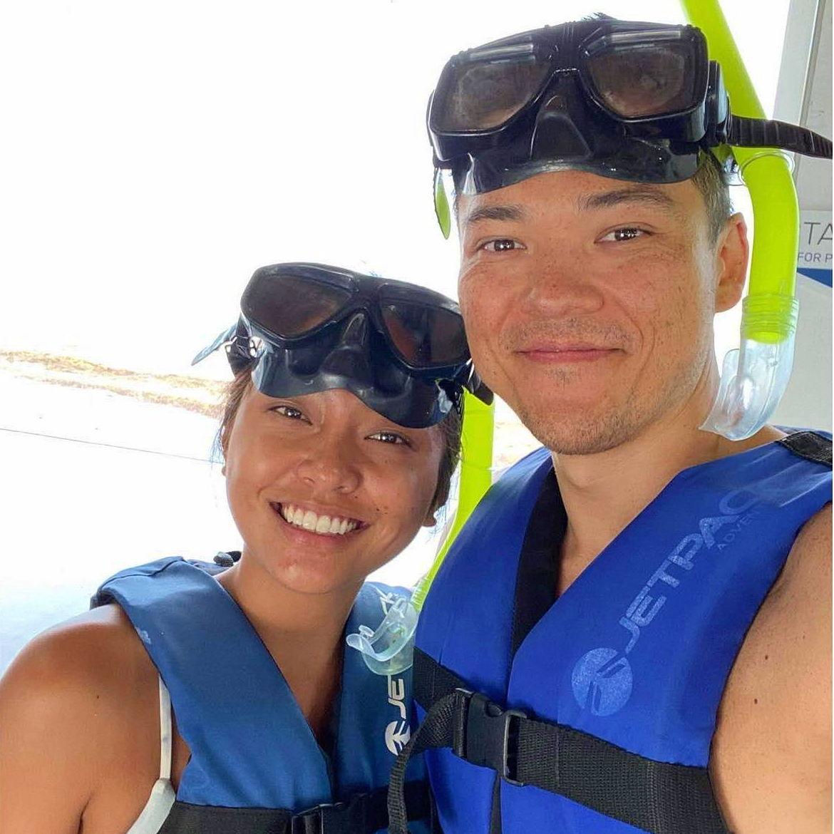 Snorkeling in Cancun (2022), even though Alyssa doesn't know how to swim.