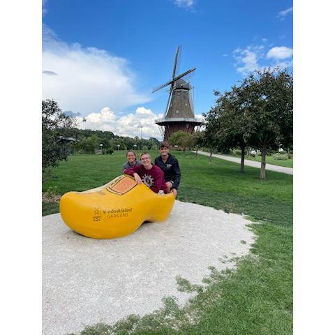 Lizzy, Tommy, and Peter wearing the same shoe when they visited Holland (Michigan)