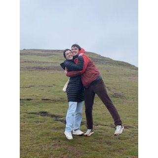 At the top of Arthur's Seat, a small mountain that we hiked up in Edinburgh, Scotland during Spring Break 2024!