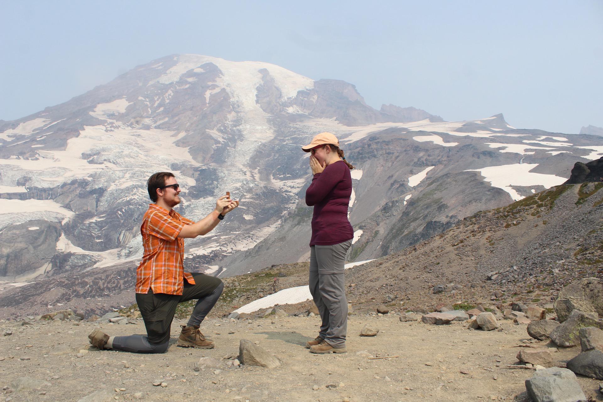 Vincent proposed on the Skyline Trail at Mt. Rainier National Park on August 14, 2021. Despite Jaimie thinking she overheard Vincent planning a “proposal hike,” she was very surprised & said YES.