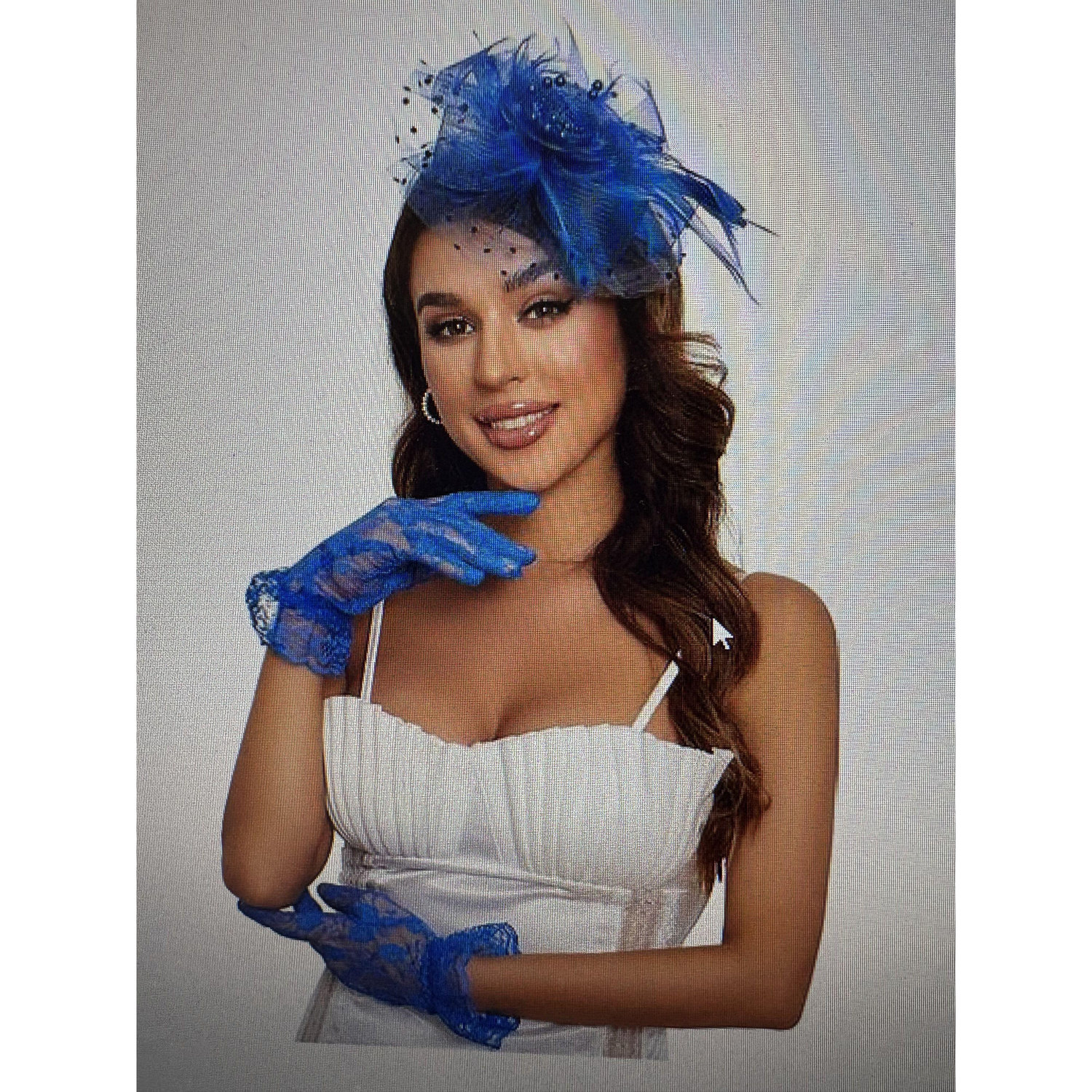 Different looks for the ladies with the fascinator hats and lace gloves