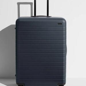 Shop Large & Checked Suitcases in Navy Blue | Away