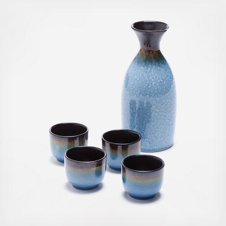 Service à saké traditionnel japonais avec pagode et fleurs de cerisier