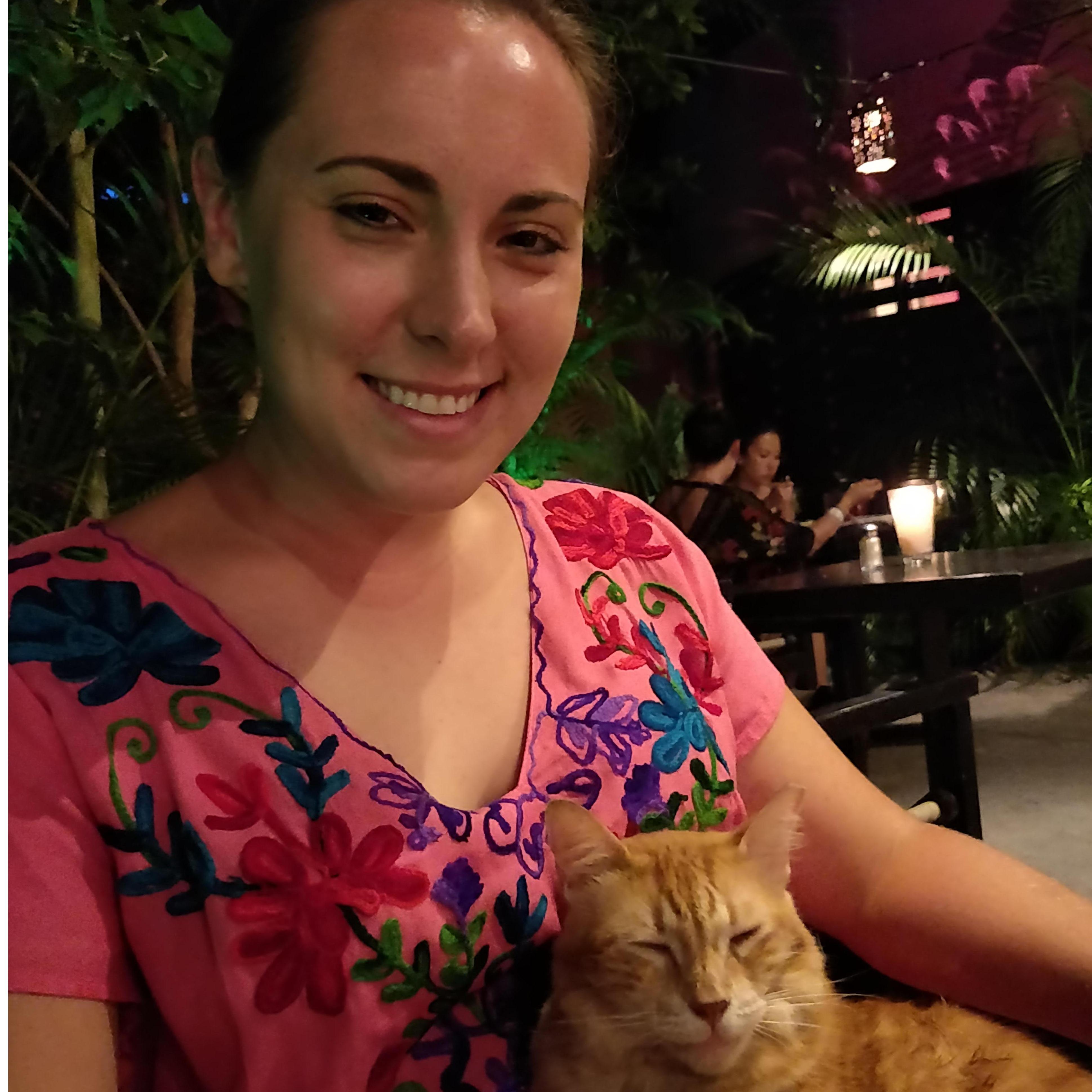 Brittany makes friends with animals wherever she goes. This is Dexter the cat in Cozumel, Mexico.