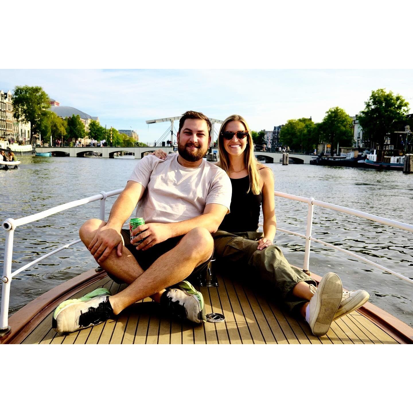 drinking a beer on a boat in amsterdam