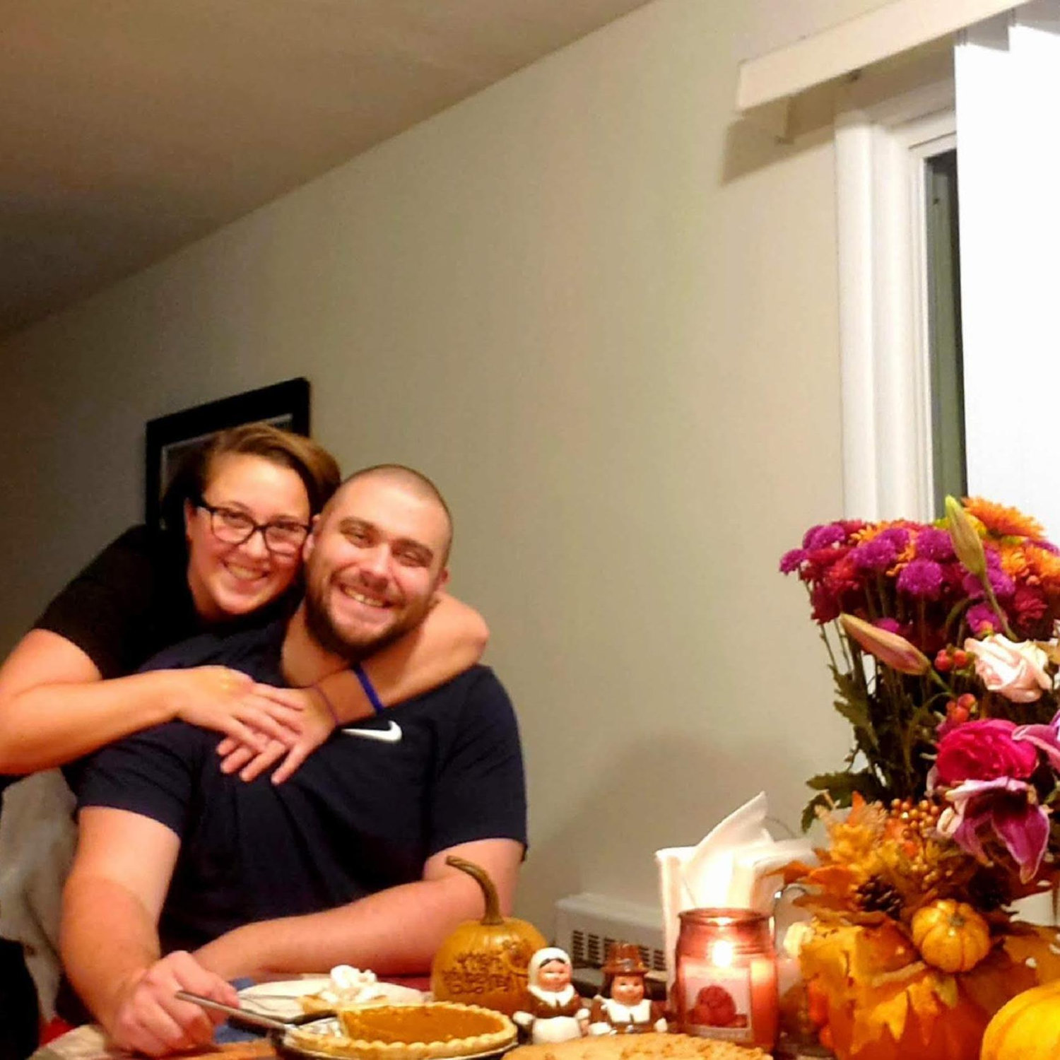 Our first Thanksgiving in MN - just the two of us!
Alt Text: Maeghan and Keiran sitting at the kitchen table with a plethora of Thanksgiving foods and decor