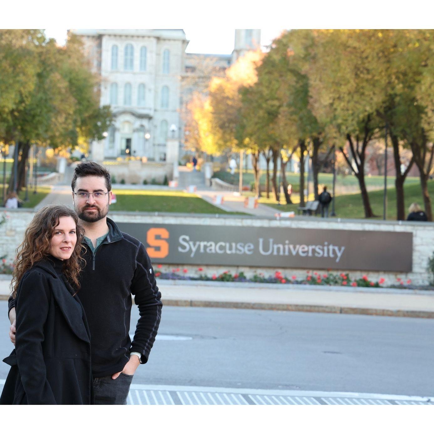 Marie and Austin at the Syracuse University Sign