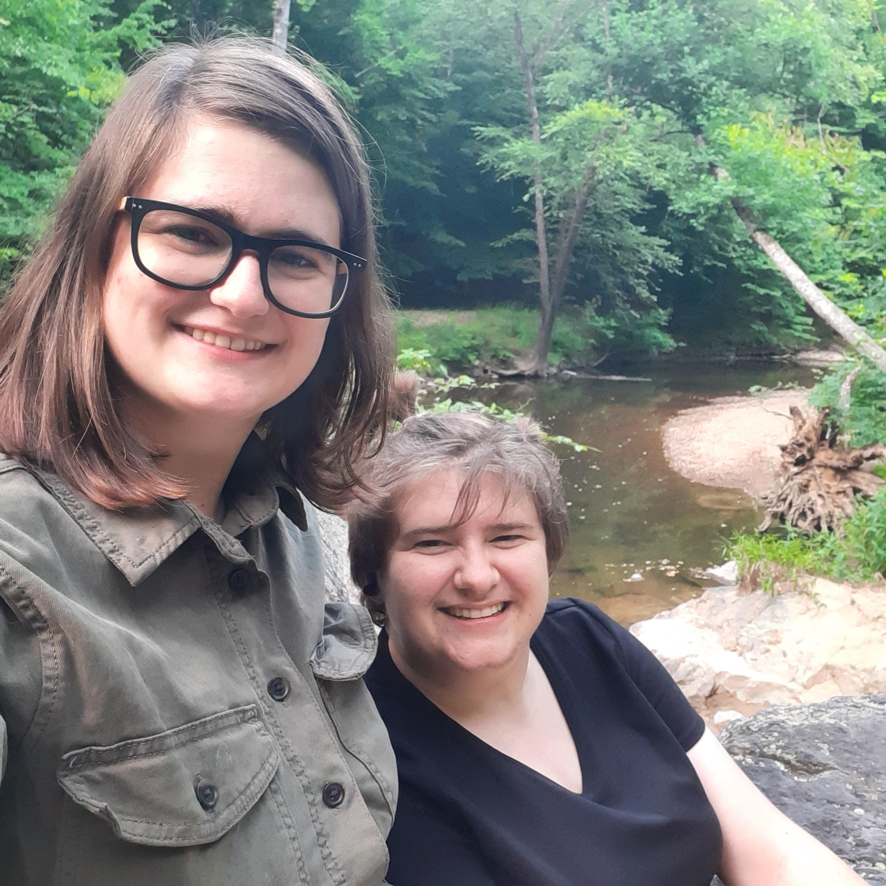 We sat up on the rock and looked out at the stream.
