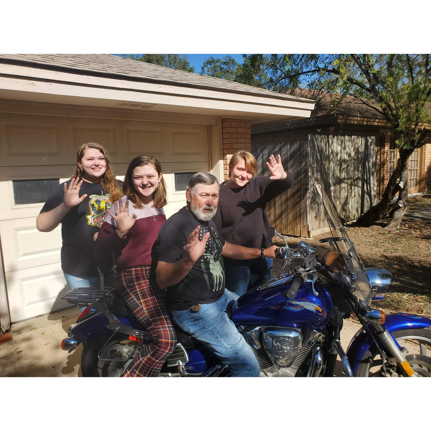 All of us on the motorcycle with Papaw