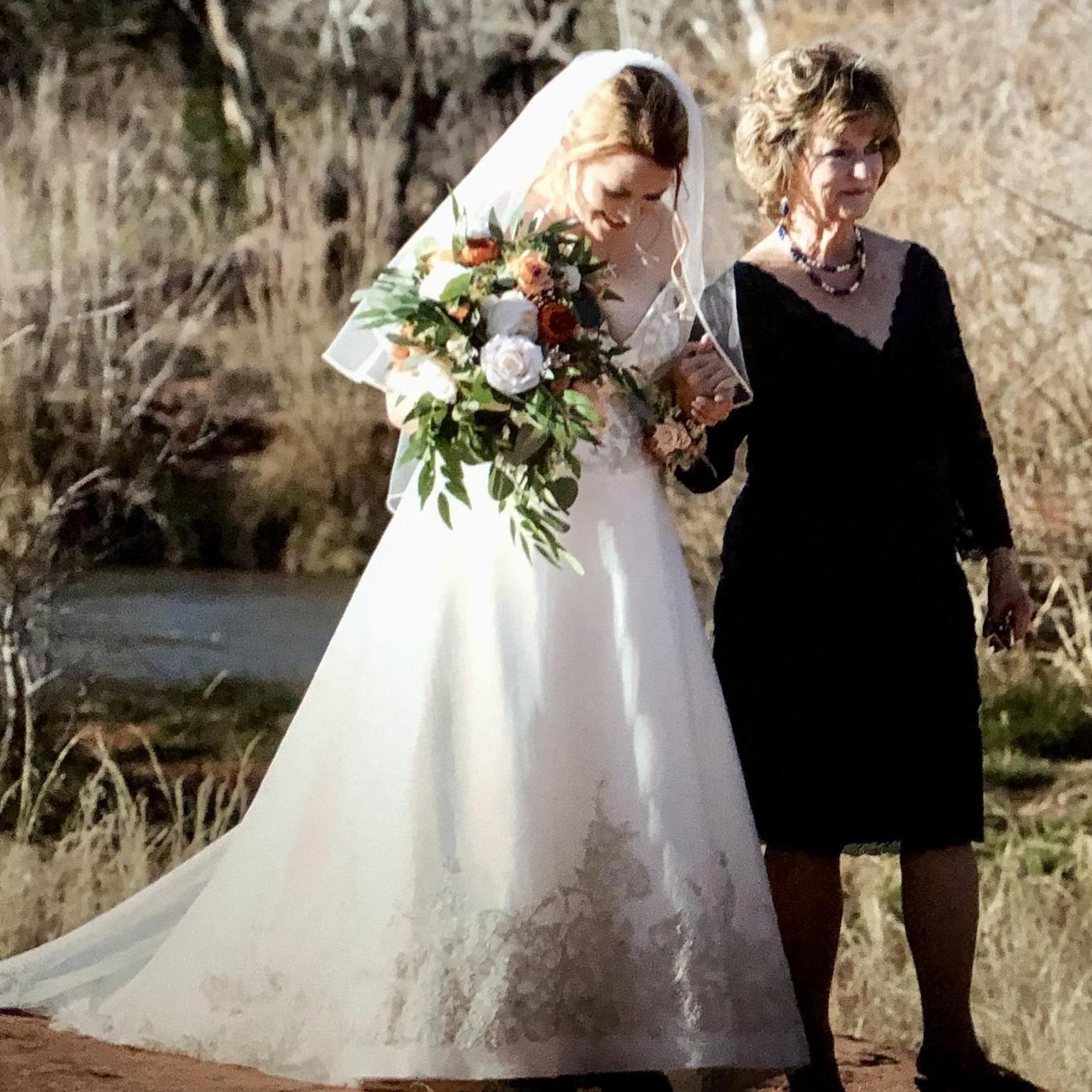 Mom walking the Bride down the isle. Such a magical moment✨