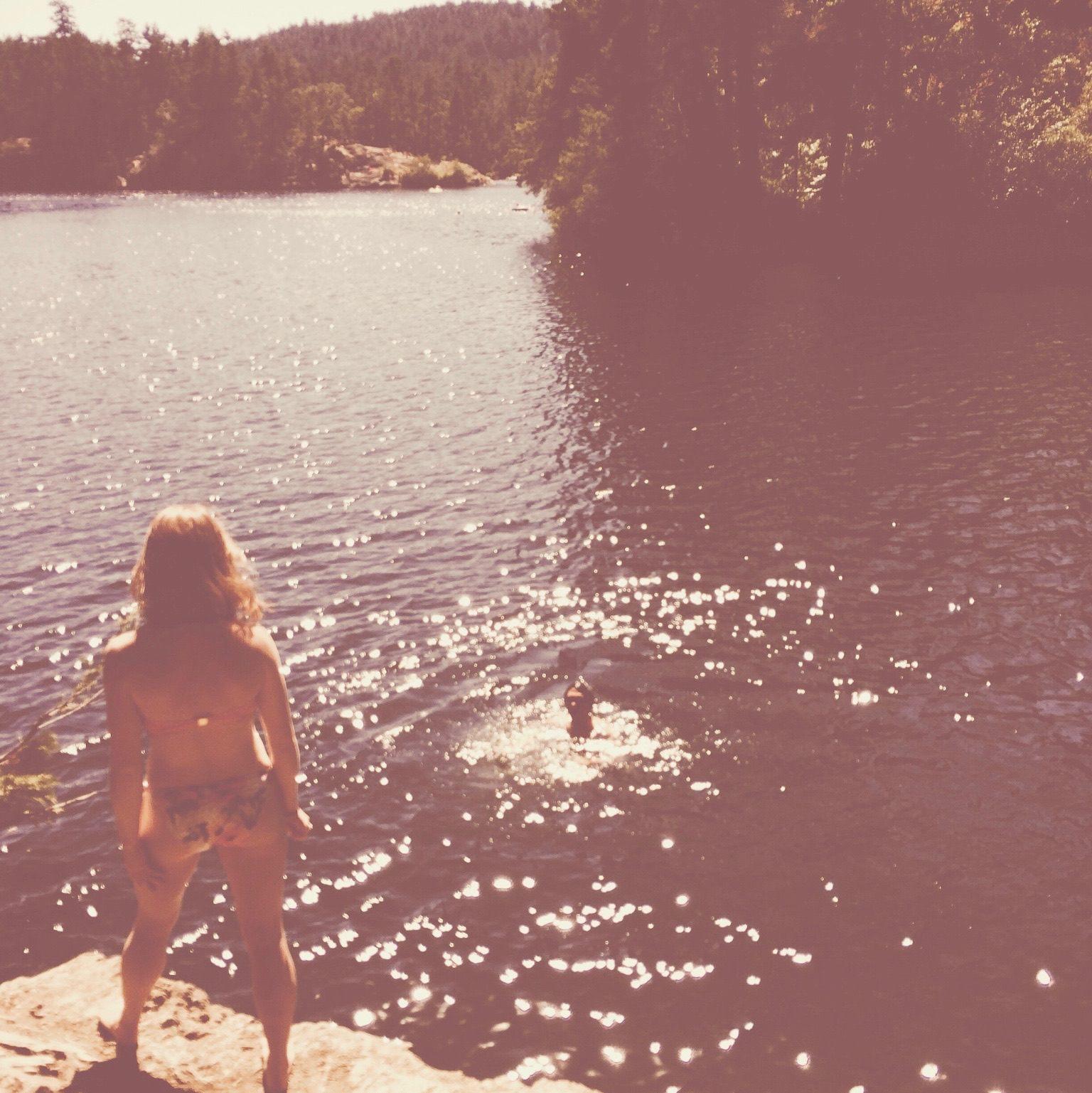 Swimming at Thetis Lake on the Island.