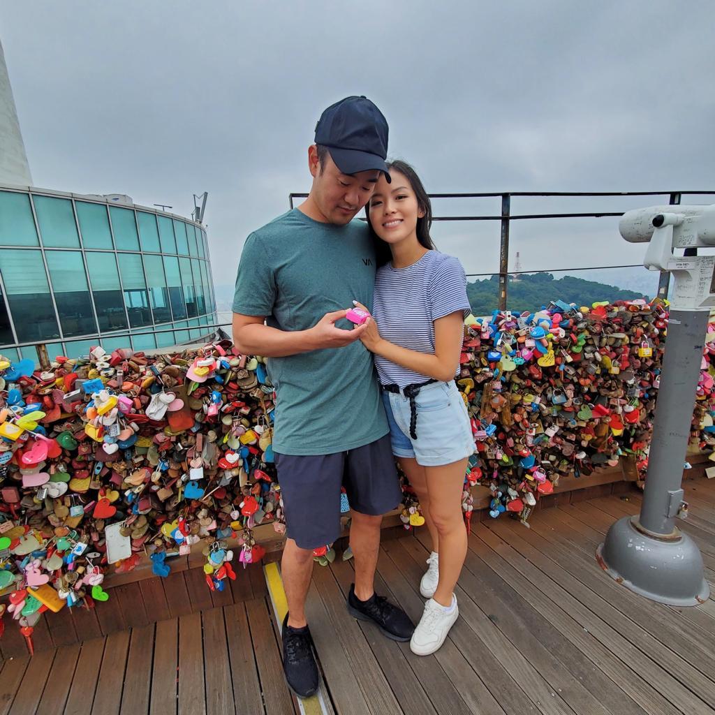 Locked in love at Namsan Tower! On our trip to Korea, we had the opportunity to participate in the love lock tradition at Namsan Tower. We wrote our names on the lock, hung it up, and threw away the key, symbolizing our commitment to each other.