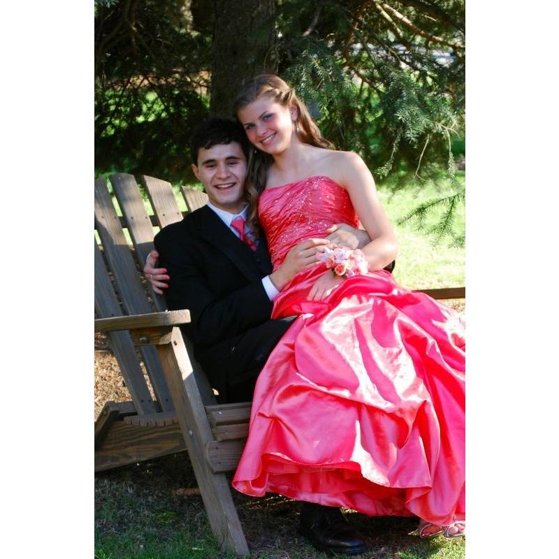 Circa 2012. Our first Prom together. After he asked with the message on the Silverman's garage.