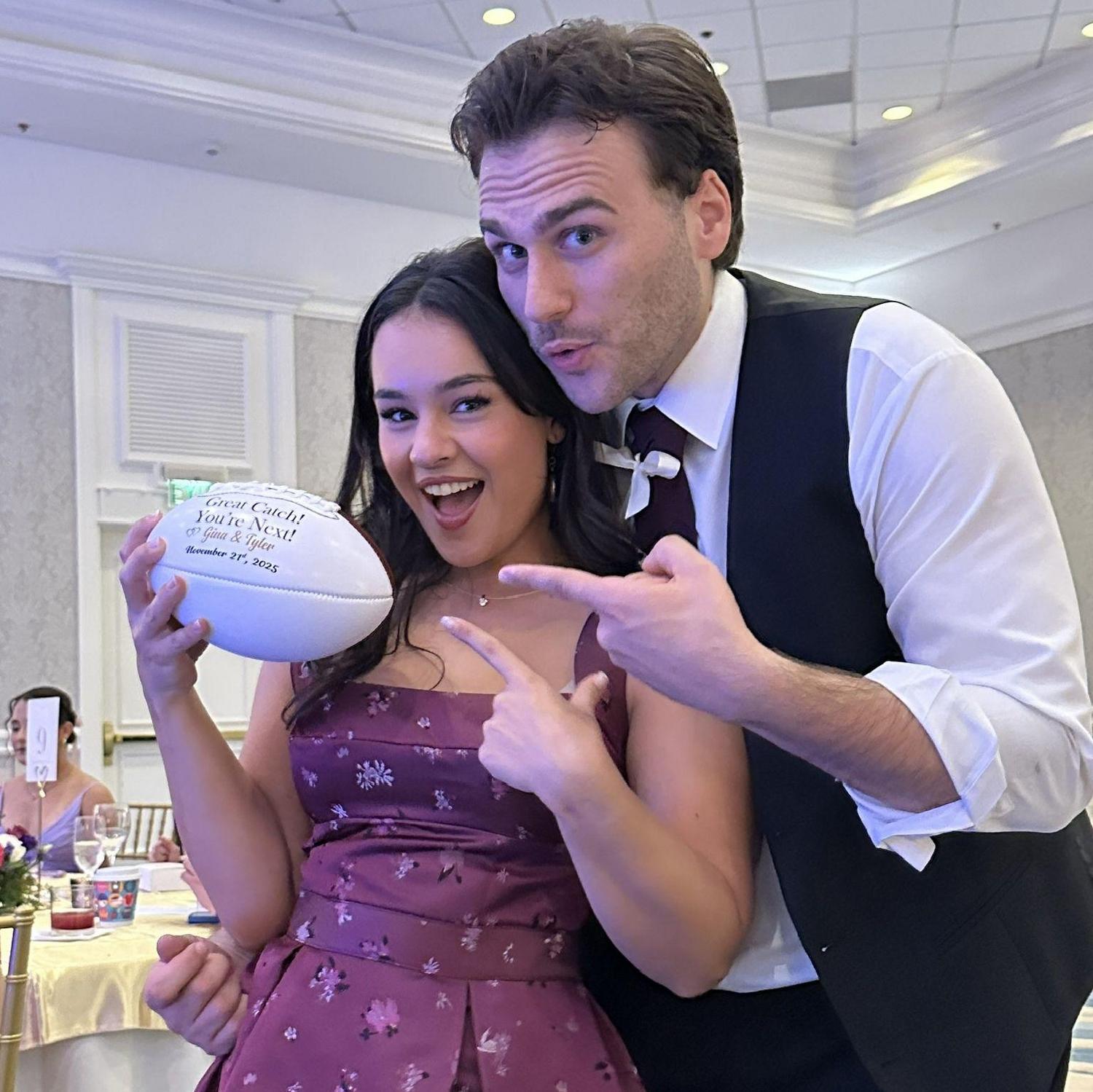 John caught the football at Ty & Gina's wedding. It worked!