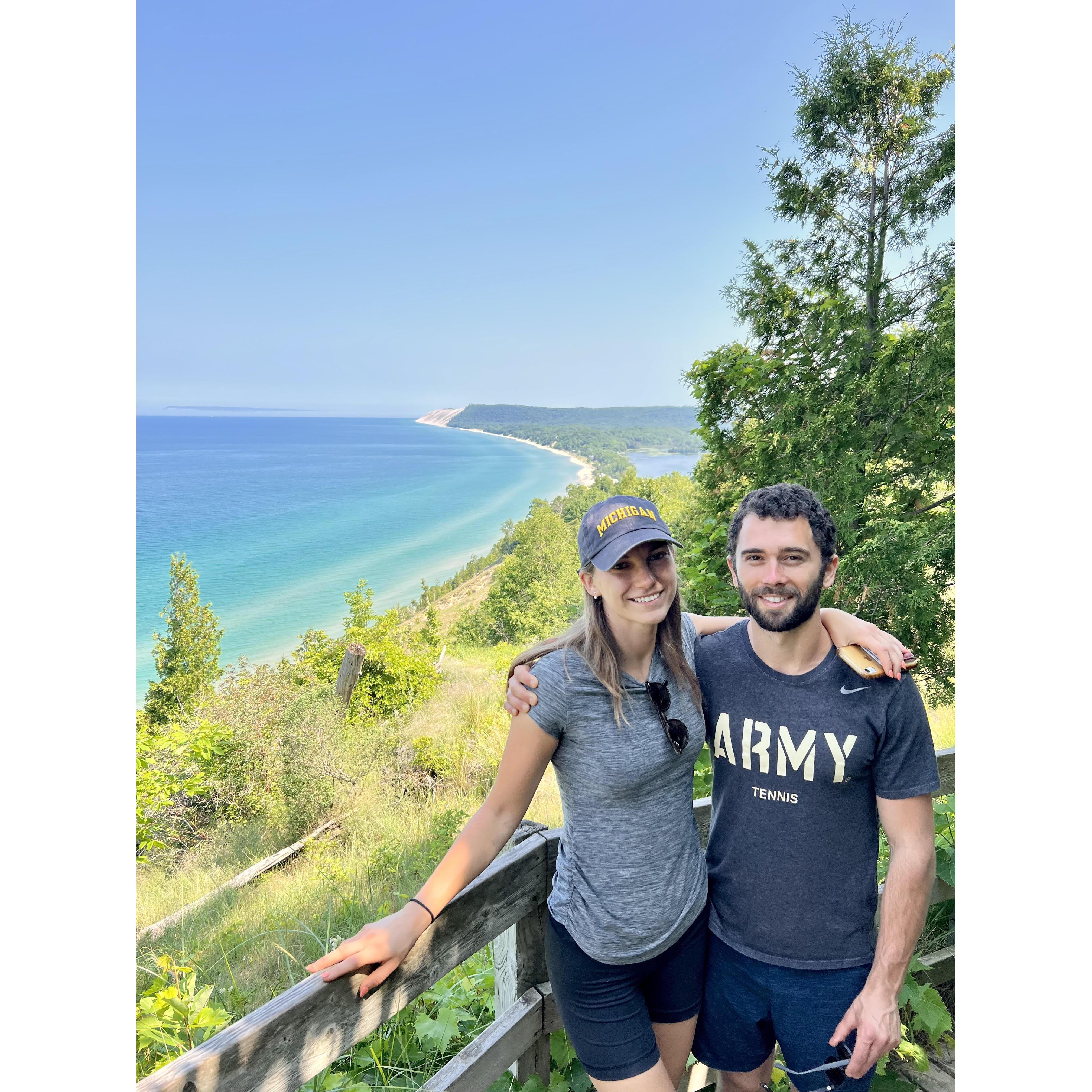 July 2023 - Alex’s favorite hike in Northern Michigan along Empire Bluff Trail. A picture doesn’t do the view (or water colors) justice!