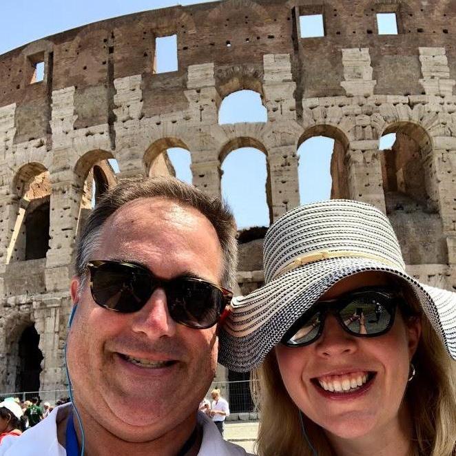 Our heads in front of the Colosseum in Rome.