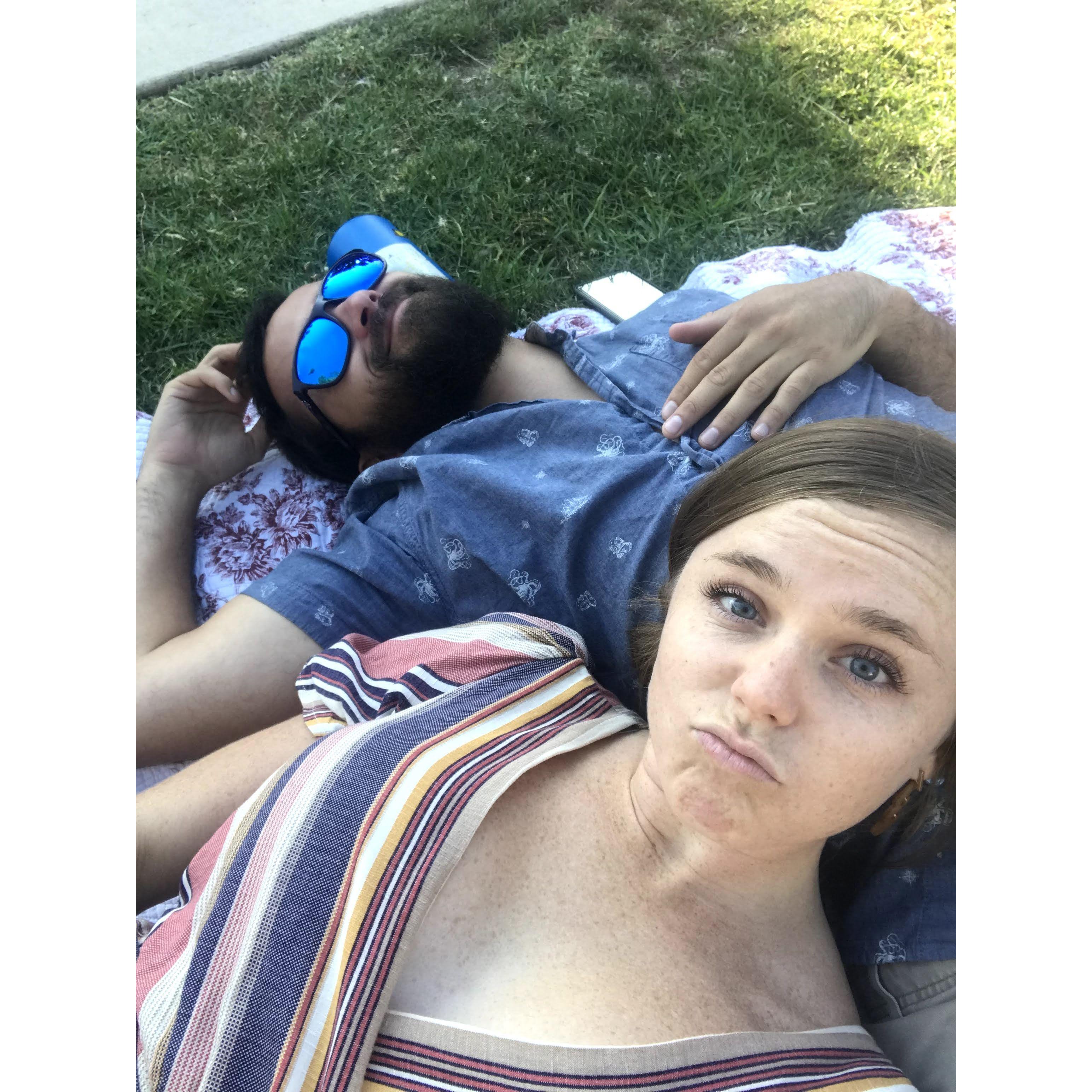 Picnic date at Balboa Park playing cribbage and eating pie.