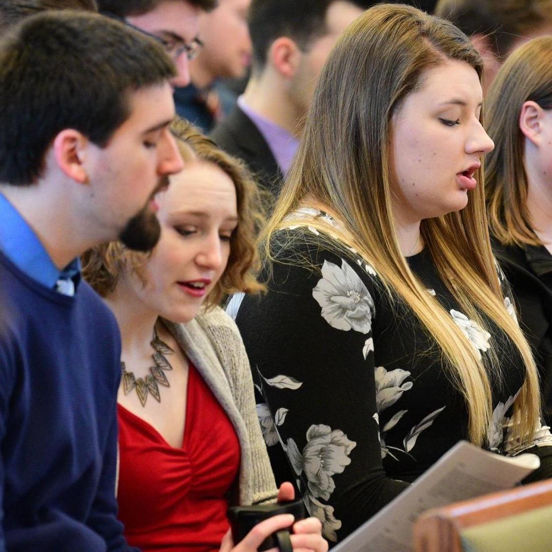 Not sure if we were photographed because we looked good or because Grace brought coffee into Chapel and they needed evidence...