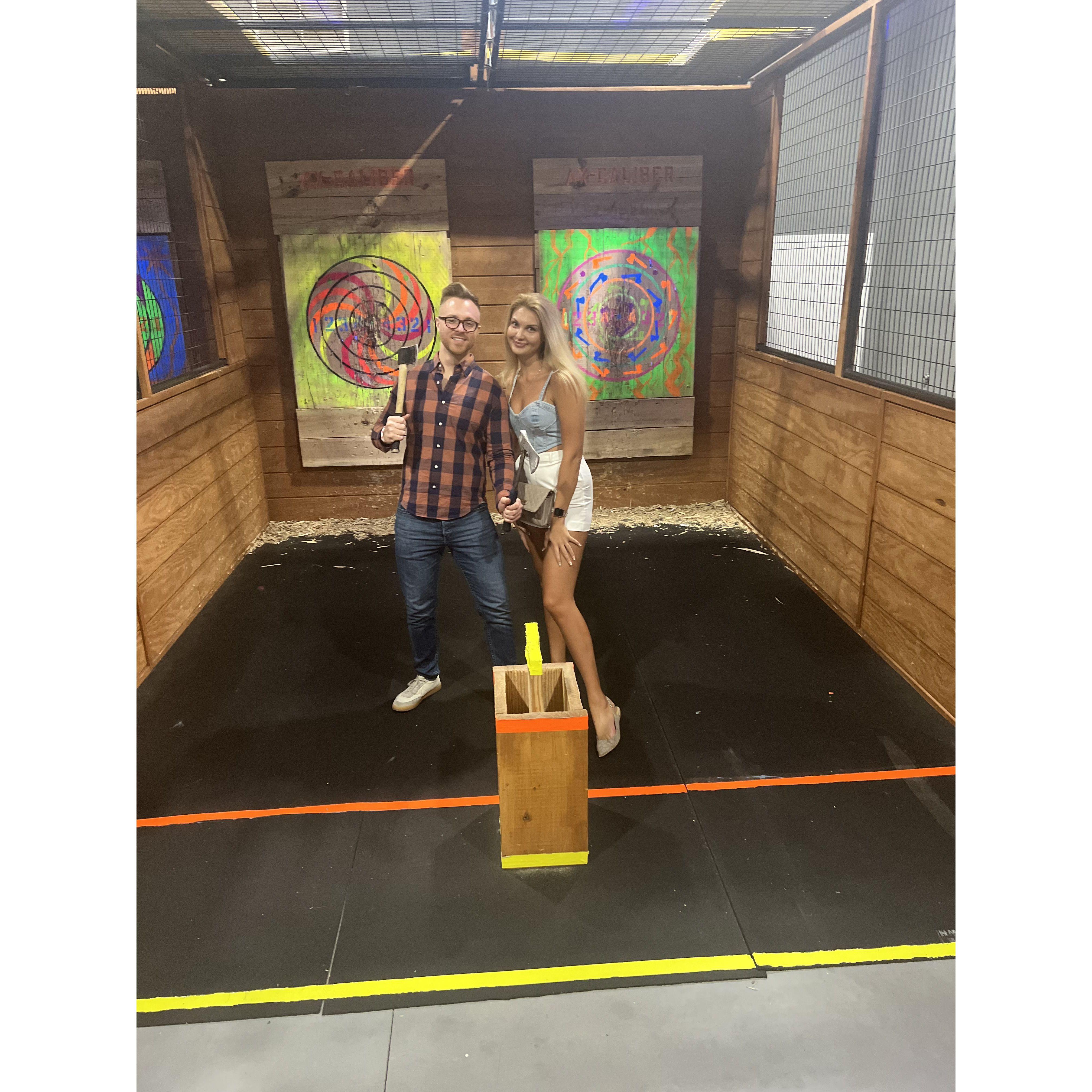 Brendan tries to impress me with his axe throwing skills