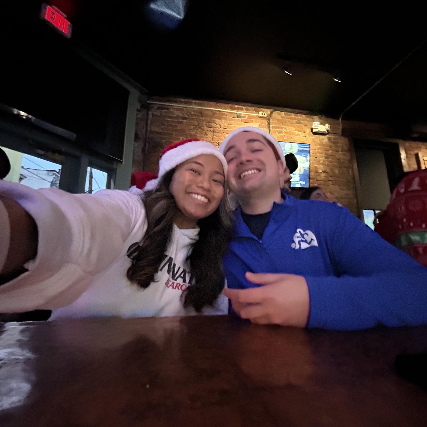 Crosstown Shootout/Santacon! A yearly tradition where their house is divided for a day