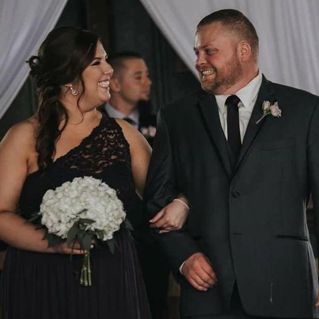 We adore this photo of us laughing while walking back down the aisle at Adam's sisters wedding!
