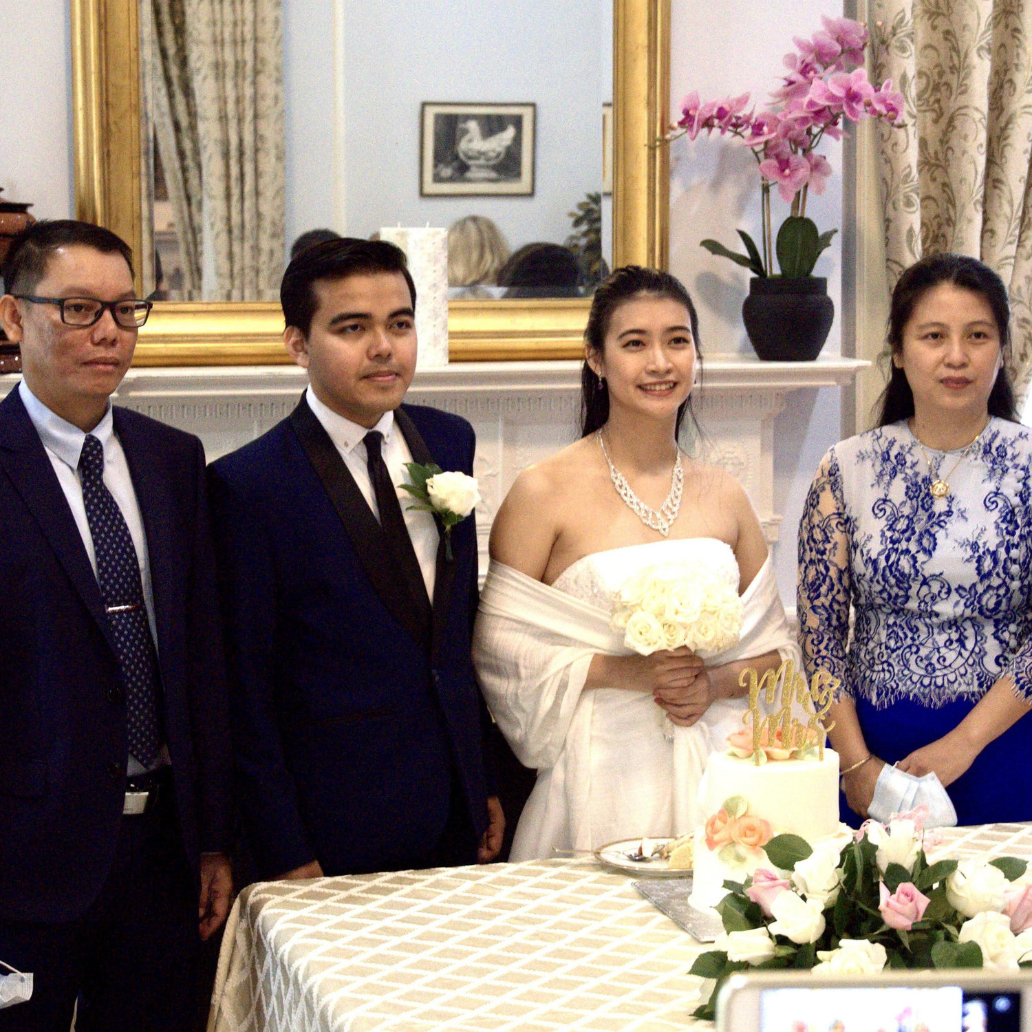 Myanmar Defense, Military, Naval and Air Attaché Colonel Aung Thurein and spouse Daw Thae Suu Aung, who served as official witnesses to the marriage.