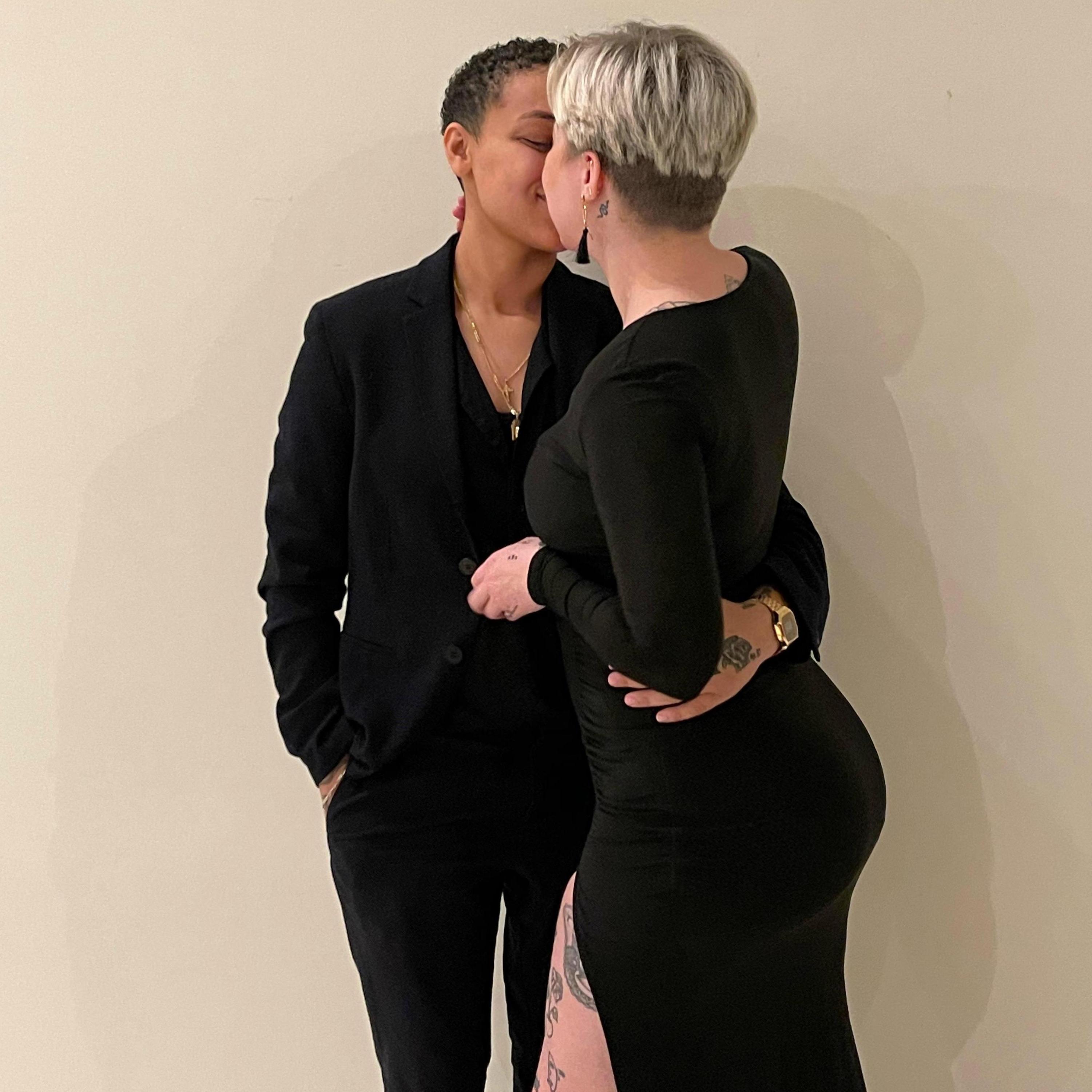 Got dressed up for the company Christmas party, caught kissing under the mistletoe.