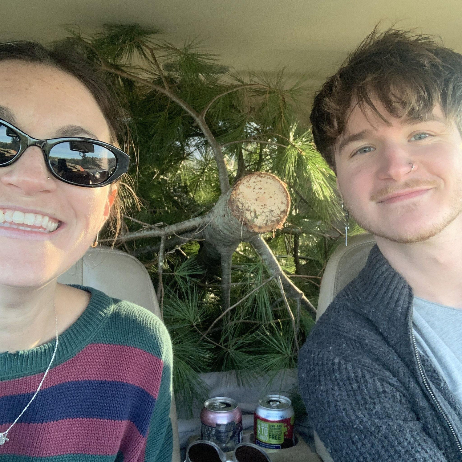 Chopped down Amanda's first tree in Wisconsin (2022).