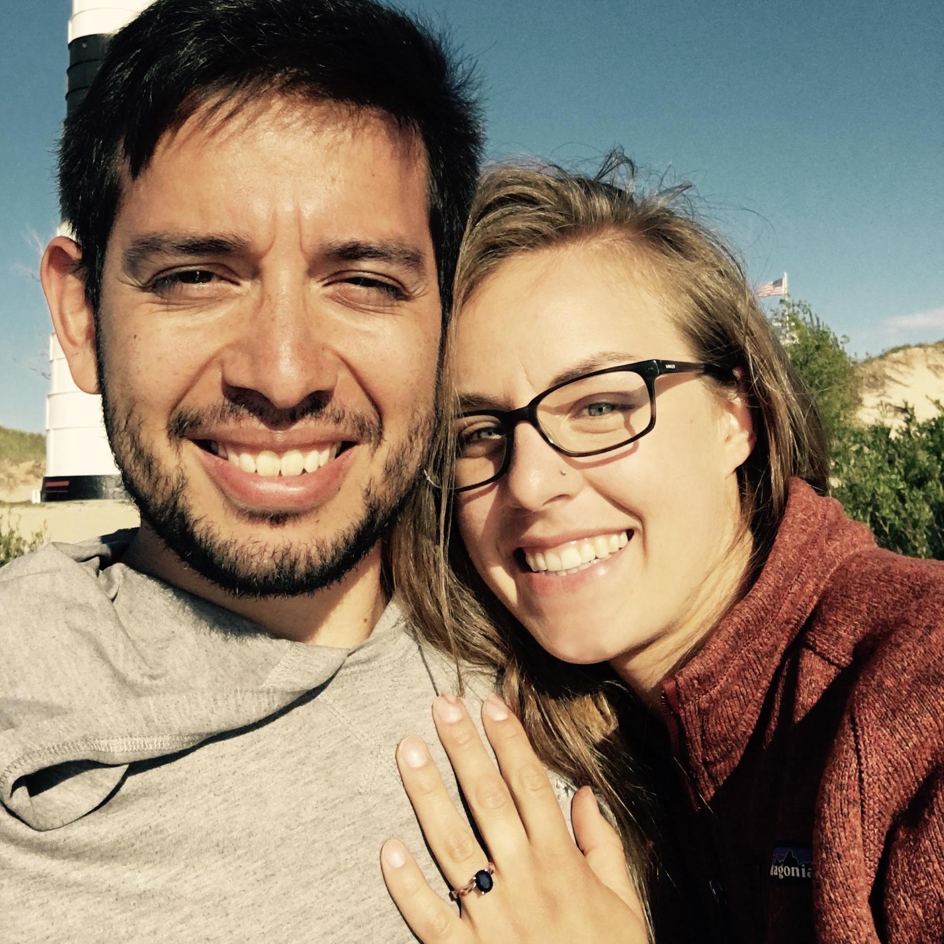 We snapped this picture just moments after Luis popped the question, on the shores of Lake Michigan.