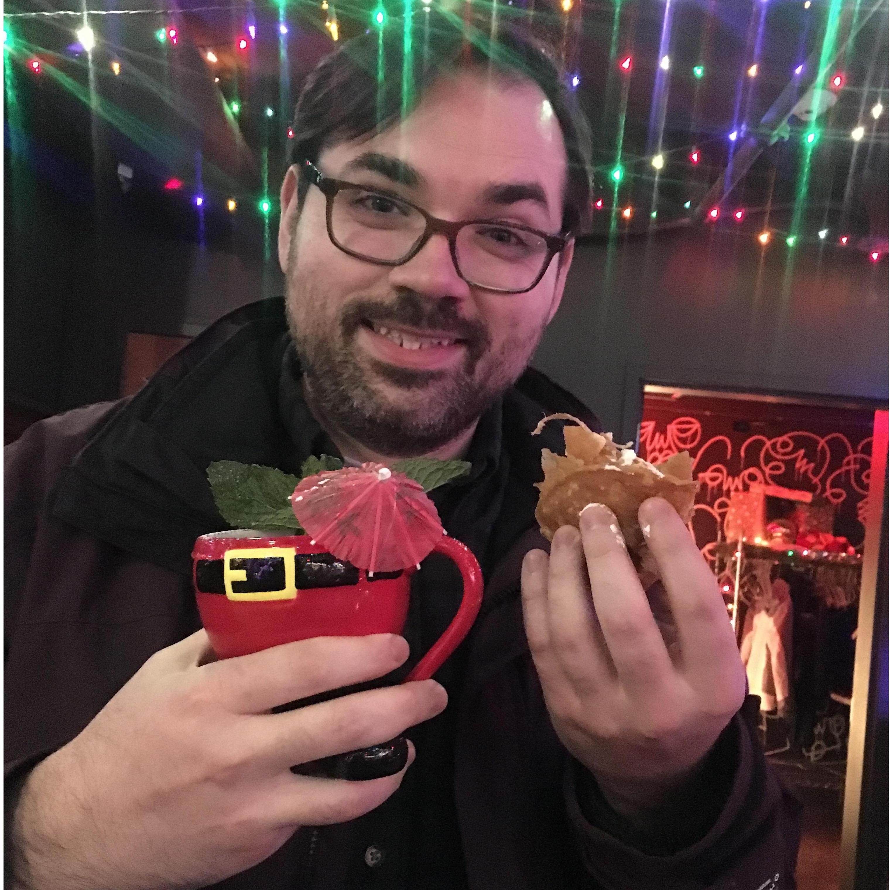 This guy had a secret! Santa cocktail and a handful of nachos at Lucille about an hour before Noah proposed.