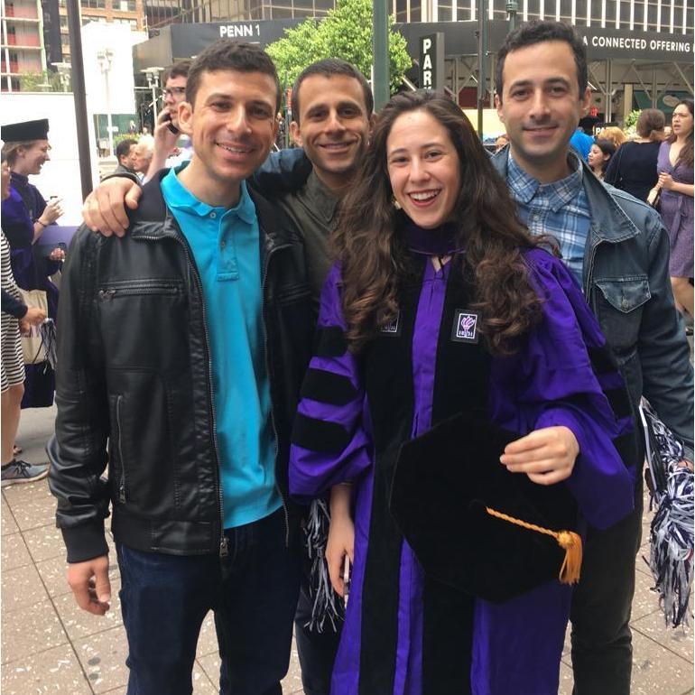 Breanna surrounded by her big brothers, Daniel, Michael, and Eric