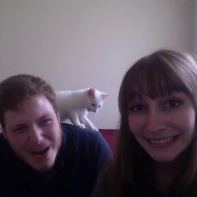 Family webcam portrait after adopting Mabeline in 2013