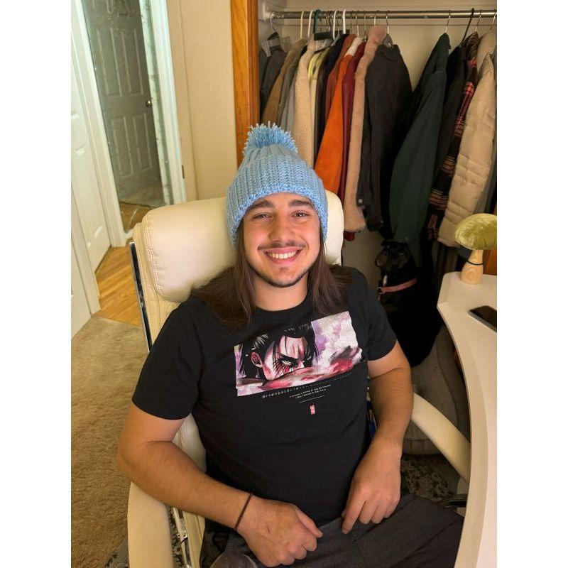 Maddie starts knitting! Paul is very supportive :)