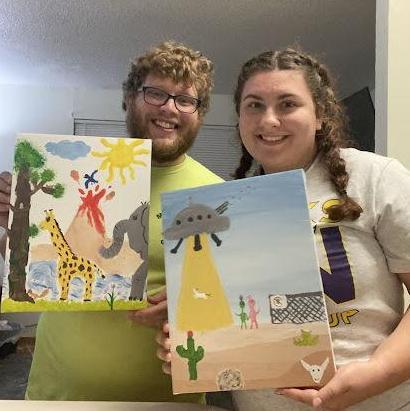 We did a "Date-Night Challenge" were you switch paintings every 5 minutes. Daltons picture is called "Jungle on Fire"  and Megan's is called "Area 51"