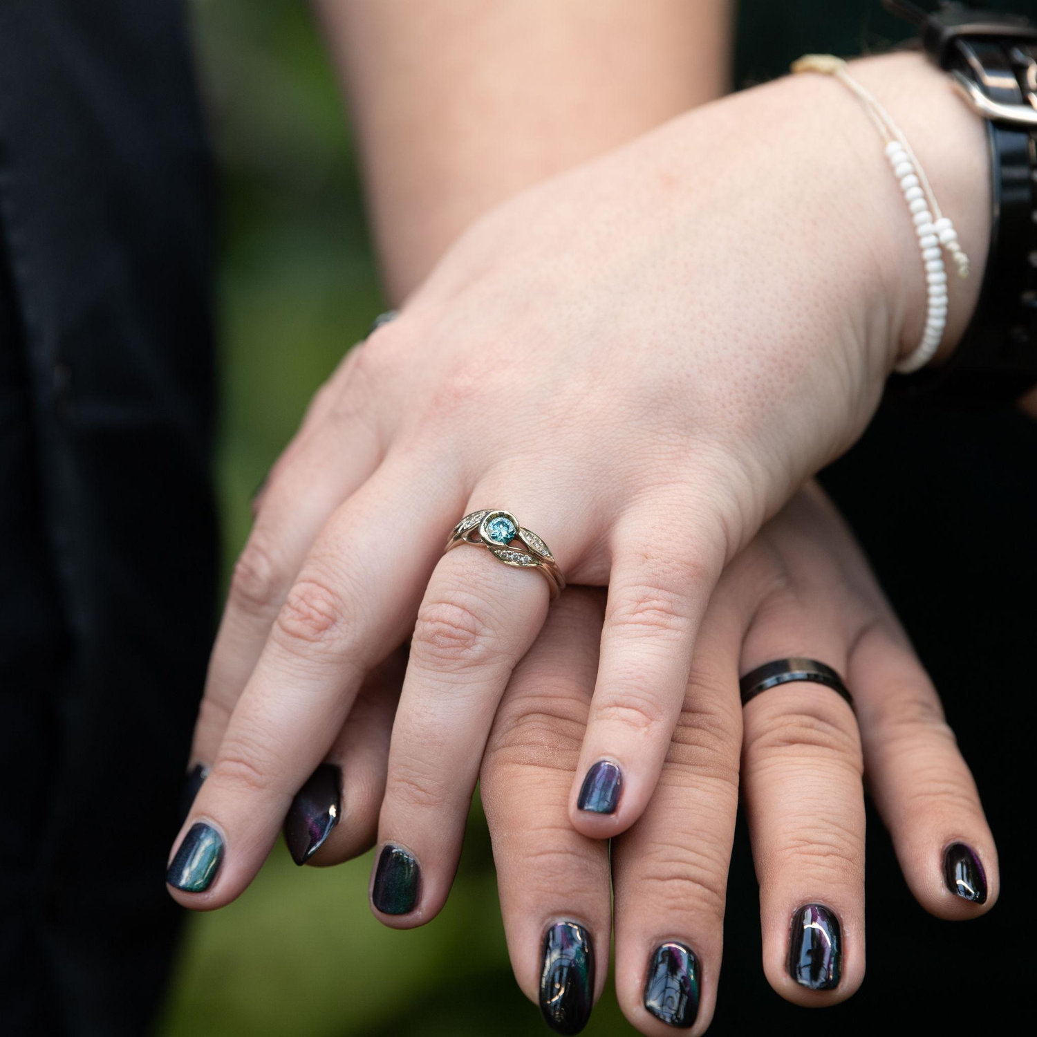 check out our matching nails (Tony got the cat-eye version of the color Arielle got)
