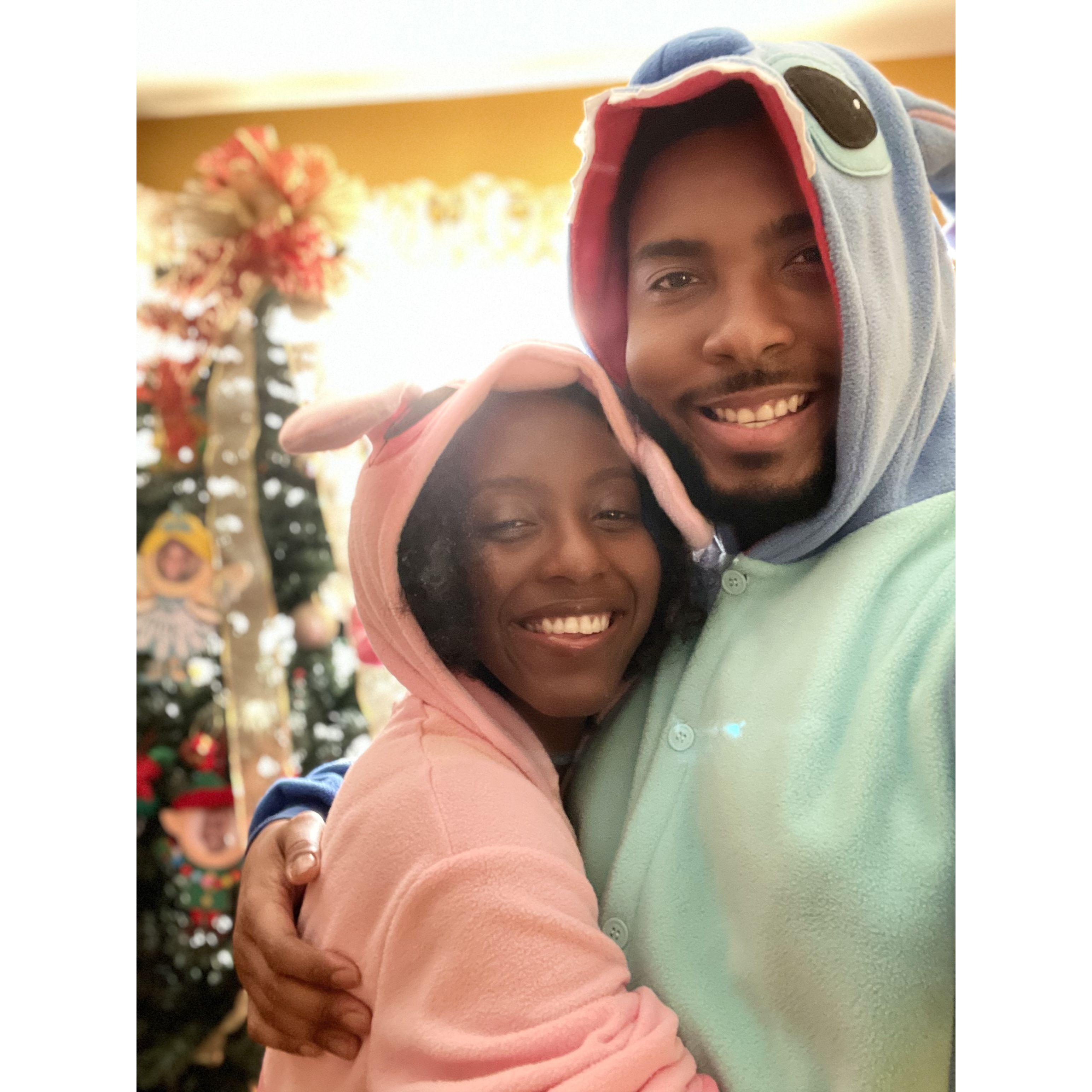 Our first Christmas together! Wearing Angel and Stitch onesies from Lilo and Stitch!